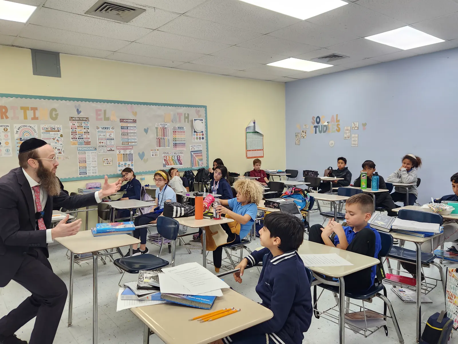 Rabbi Eli Scheller teaching students in Hollywood, Florida