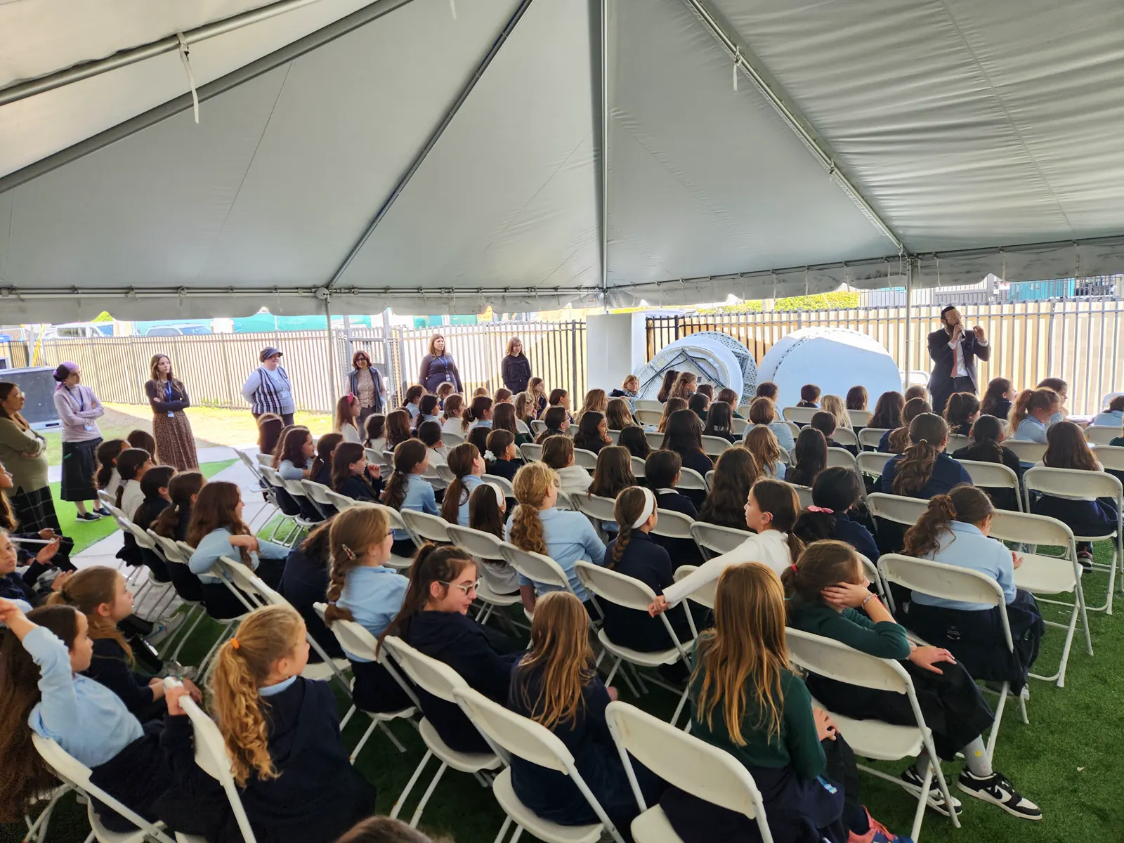 Rabbi Eli Scheller teaching students in Miami, Florida