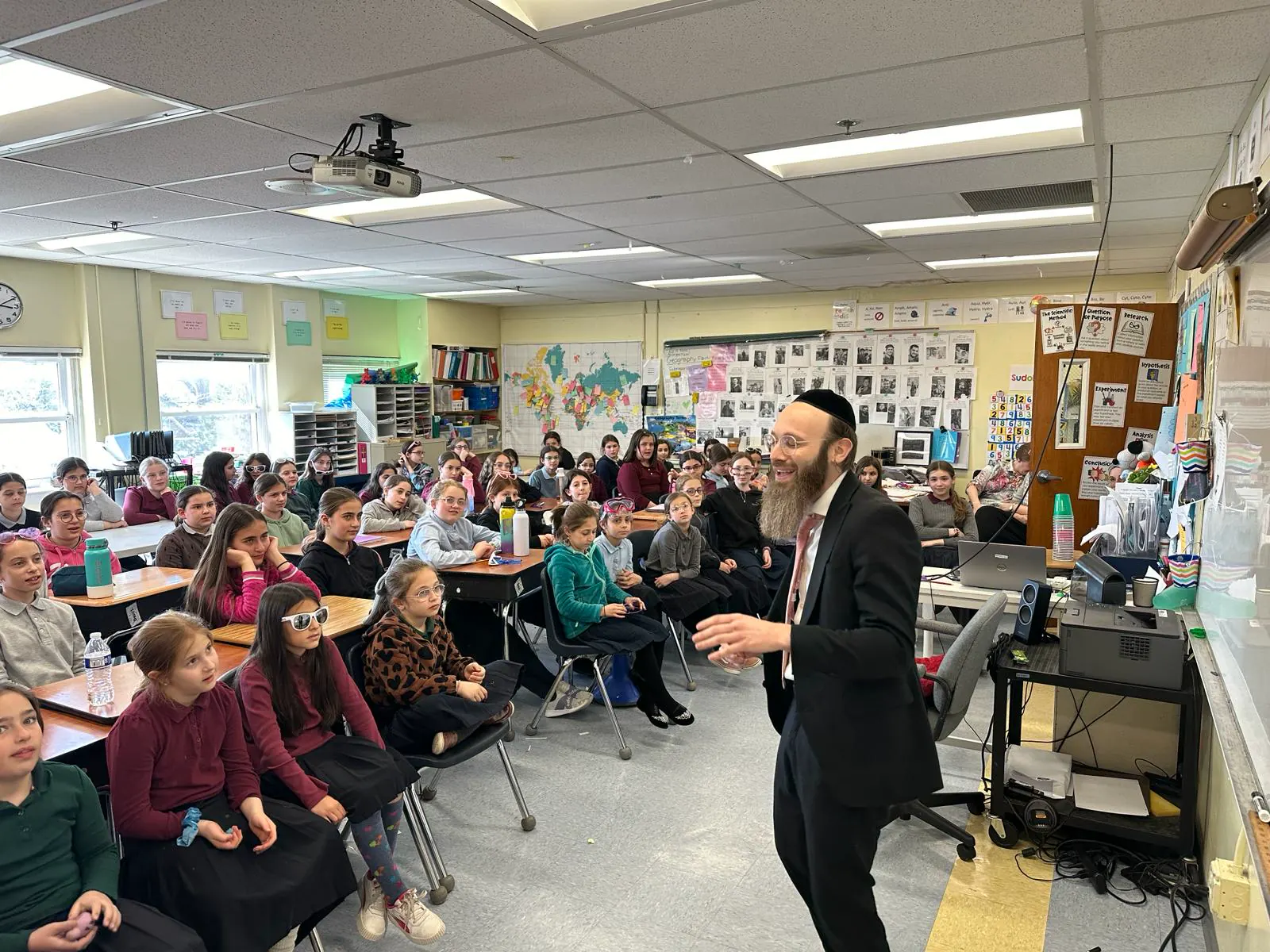 Rabbi Eli Scheller teaching students in Silver Spring, Maryland